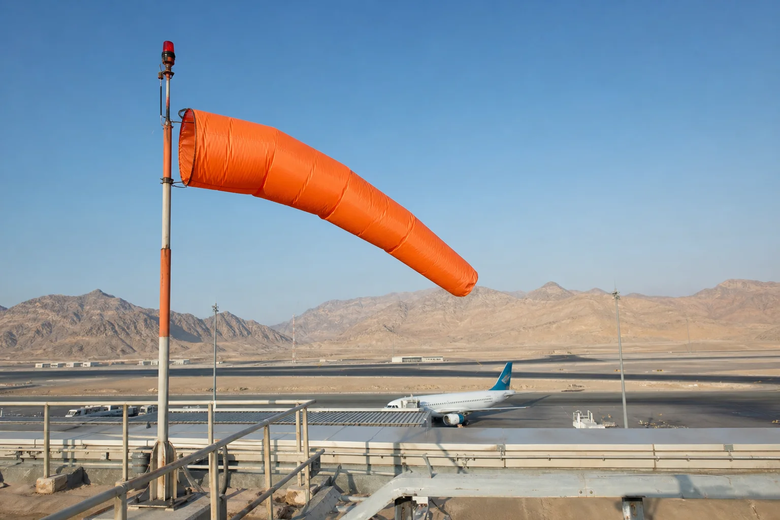 Aviation windsock at Oman airport terminal — original Fire Supplies Oman photograph